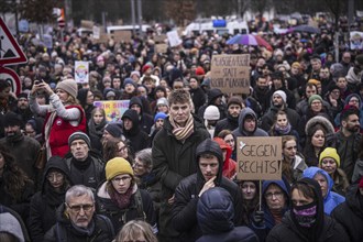 150, 000 people gather around the Bundestag in Berlin to build a human wall against the shift to