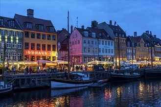 Nyhavn, in the Frederiksstaden district, in the evening, harbour district with houses over 300