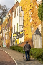 Large mural as part of the Urbanart campaign Weltbaustellen North Rhine-Westphalia, on the themes