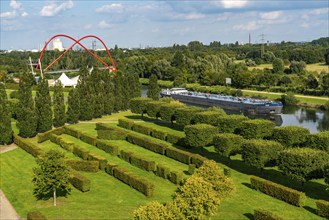 The Nordsternpark, former site of the Nordstern colliery, cargo ship on the Rhine-Herne Canal, in