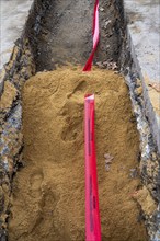 Indications in an excavation pit above laid district heating pipes, in the ground, Duisburg, North