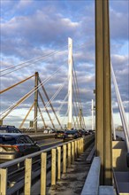 Traffic on the A40 Neuenkamp bridge, piers and stay cables of the new motorway bridge over the