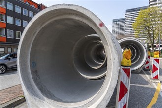 Concrete sewer pipes, stored on a construction site during sewer renovation work, on the Dickswall,