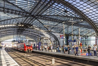 Central station with platform hall with glass roof construction, regional train, Berlin, Germany,