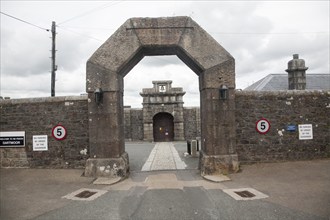 Entrance arches and doorway to Dartmoor prison, Princetown, Devon, England, UK