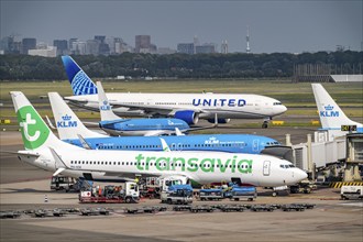 Amsterdam Schiphol Airport, aeroplanes on the taxiway, at the terminal, Gate D, check-in, apron,