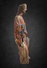 Palmesel, wooden figure from around 1380, figure of Christ, isolated on a dark background,