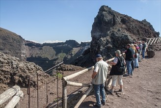 Tourists on a path along the crater edge, Vesuvius, near Naples, Parco Nazionale del Vesuvio,