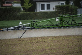 Agriculture, pesticide being sprayed on a field, sugar beet seedlings, North Rhine-Westphalia,