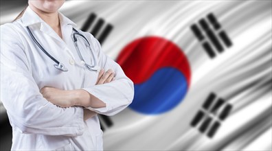 Doctor with stethoscope on South Korean flag. Health and care on South Korean flag. Doctor with