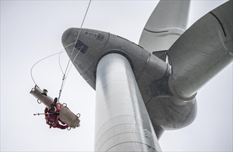 Height rescuers from the Oberhausen professional fire brigade practise abseiling from a wind