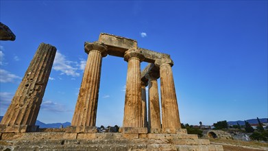 Archaic Temple of Apollo, Doric columns, The majestic ruins of an ancient temple under a clear blue