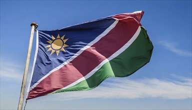 Flags, the national flag of Namibia flutters in the wind