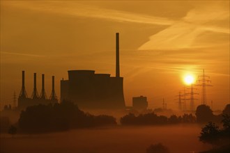 Gersteinwerk power station and high-voltage pylons at sunrise, Werne-Stockum, North