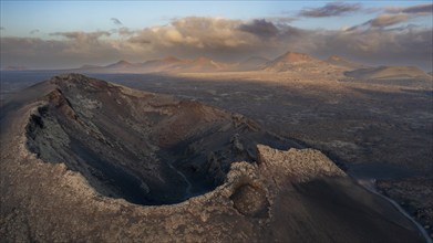 Aerial view of the El Cuervo volcano at sunrise, Lanzarote, Lanzarote, Canary Islands, Spain,