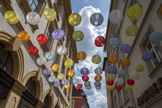 Colourful lanterns in the streets of the old town, Würzburg, Lower Franconia, Bavaria, Germany,