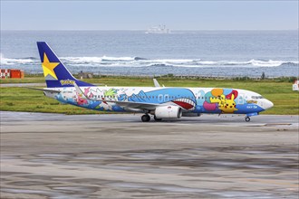 A Boeing 737-800 aircraft of Skymark Airlines with the registration JA73NG and the Pikachu Jet BC2