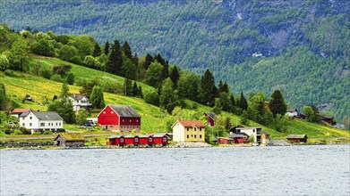 Mountains and Fjord over Norwegian Village, Olden, Innvikfjorden, Norway, Europe