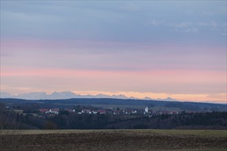 Alpine panorama near Magolsheim. Säntis, Swiss Alps at sunset with a view of Mehrstetten. View from