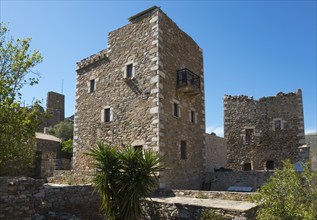 Historic stone towers and buildings in a traditional village, residential towers, Vathia, Ithylo,