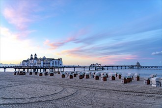 The pier of Sellin, evening mood, sunset, 394 metres long, with restaurant, jetty, beach chairs,