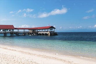 Small jetty on a tropical island in the marine park. Malaysia