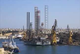 Industrial activity and cranes at docks French Creek, China Dock, Il-Kortin, Grand Harbour,