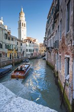 Tourist boat in the old town with San Girgio dei Greci, church, city trip, holiday, travel,