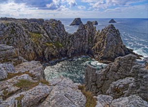 Formation of rugged rocks at Pointe de Penhir, a cape on the Crozon Peninsula, on the Atlantic