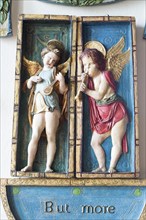 Painted plaster angels in village parish church of Saint Michael, Wilsford cum Lake, Wiltshire,