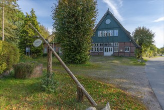 Half-timbered house Landhotel and Café Fischerwiege in Passade, thatched roof, street, trees,