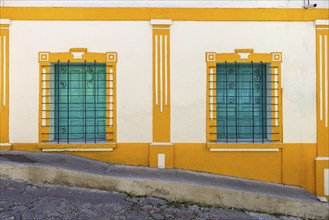 Colorful colonial architecture of historic center of Flores, Guatemala, Central America