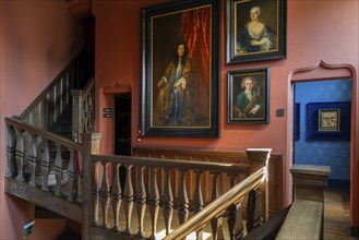 Painted portraits in the Egmond Staircase at Kasteel van Gaasbeek, medieval castle but renovated in