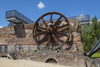 Big winding wheel from colliery headframe at Le Bois du Cazier, coal mining museum at Marcinelle