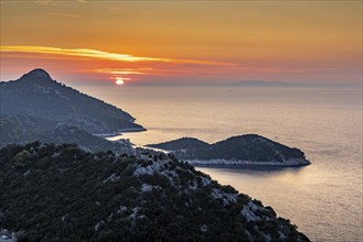 Red sunset over a group of islands in the sea, rolling hills, Lastovo, Neretva, Croatia, Europe