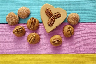 Mexican candy sweets cajeta heart with pecan nuts