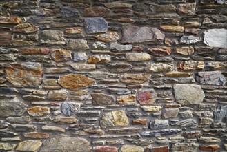 Slate stone masonry stone wall in Andorra Pyrenees