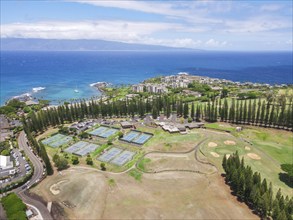 Aerial view of tropical destination with white sand and turquoise water. Kapalua coast in Maui,