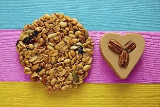 Mexican candy sweets Palanqueta with peanuts and cajeta heart with pecan nuts