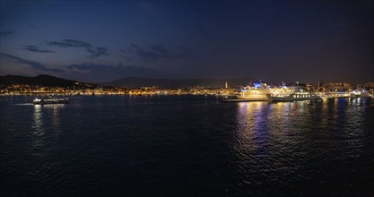 Harbour at night, illuminated ships with their light reflections in the water, Split, Dalmatia,