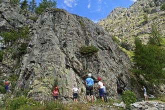 Climber on the rock in a climbing crag in the Van d'en Haut climbing area, Vallon de Van, Salvan,