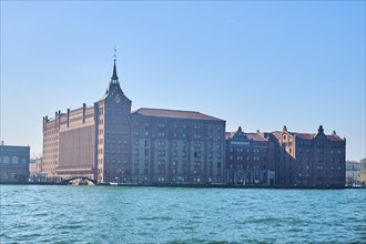 View from the water on Hilton Hotel beside the water in Venice on a sunny day in winter, Italy,