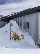 Snow blower in front of a metal building, Upper Austria, Austria, Europe