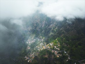 Aerial drone view of Curral das Freiras village in Valley of the Nuns from Miradouro da Eira do