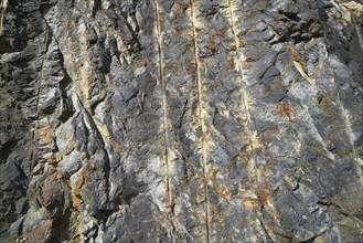 Slate stone detail in pyrenees with drill holes