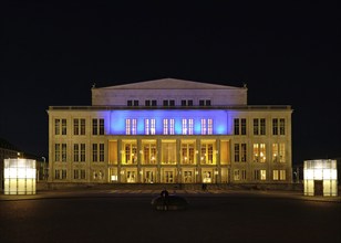 Leipzig Opera in the evening in the colours of Ukraine. Leipzig, Saxony, Germany, Europe