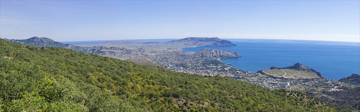 Panorama of the Black Sea coast, a view from the Perchem mountain on the resort town of Sudak and