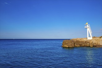 Denia Las Rotas Trampoli beach and tower in Mediterranean Spain Alicante