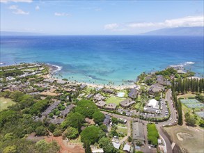 Aerial view of tropical destination with white sand and turquoise water. Kapalua coast in Maui,