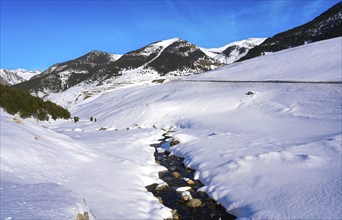 Cerler snow stream in Pyrenees of Huesca in Spain